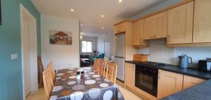 Kuchyň nebo kuchyňský kout v ubytování Shallow Sea-Point