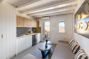 A kitchen or kitchenette at Ultramare Superior Suites with Seaview