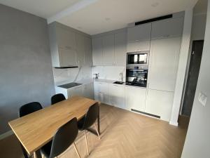 Η κουζίνα ή μικρή κουζίνα στο Apartament Aurora