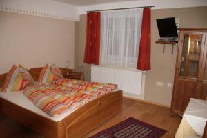 Posteľ alebo postele v izbe v ubytovaní Haus Resi