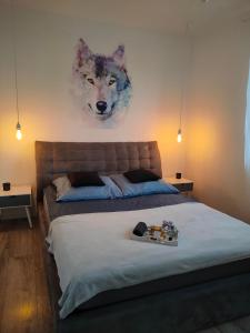 Posteľ alebo postele v izbe v ubytovaní Apartamenty Oleńka I - Szczytno Mazury