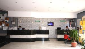 TV a/nebo společenská místnost v ubytování Sunpark Garden Hotel