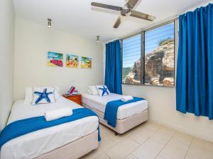 Ένα ή περισσότερα κρεβάτια σε δωμάτιο στο 1 Bright Point Apartment 5301 +8 φωτογραφίες