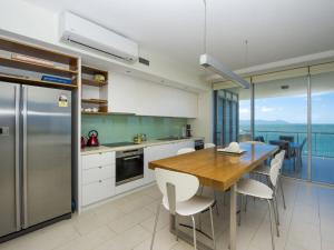 A kitchen or kitchenette at 1 Bright Point Apartment 4201