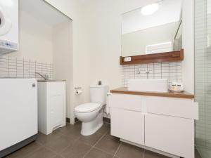 A bathroom at 1 Bright Point Apartment 4501