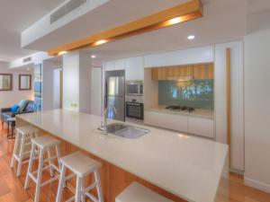 Kuhinja ili čajna kuhinja u objektu Maggies Beachfront Apartment 10