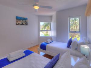 Krevet ili kreveti u jedinici u okviru objekta Maggies Beachfront Apartment 10