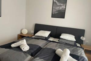 Łóżko lub łóżka w pokoju w obiekcie Galerie Wohnung Hechelstein / Top 106