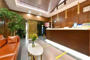 Istumisnurk majutusasutuses Xingshe Alley Courtyard Hotel Beijing Wangfujing Forbidden City Branch - Breakfast included & English speaking reception & Free WiFi and Laundry room & Hutong Culture & Cat-keeping & Flower-growing Terrace & One day tour service & Free coffee