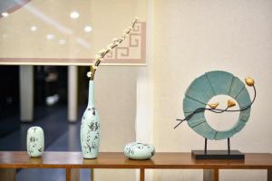 Foto Pekingis asuva majutusasutuse Xingshe Alley Courtyard Hotel Beijing Wangfujing Forbidden City Branch - Breakfast included & English speaking reception & Free WiFi and Laundry room & Hutong Culture & Cat-keeping & Flower-growing Terrace & One day tour service & Free coffee galeriist