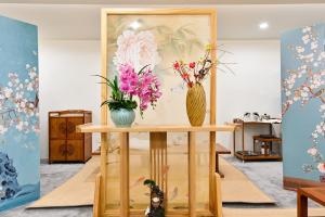 Istumisnurk majutusasutuses Xingshe Alley Courtyard Hotel Beijing Wangfujing Forbidden City Branch - Breakfast included & English speaking reception & Free WiFi and Laundry room & Hutong Culture & Cat-keeping & Flower-growing Terrace & One day tour service & Free coffee