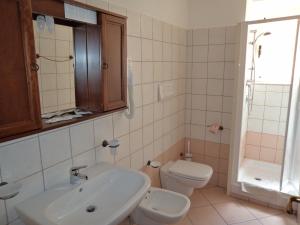 Koupelna v ubytování Albergo Tirreno