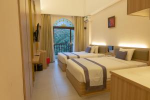 Katil atau katil-katil dalam bilik di @K Hotel