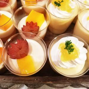 a group of bowls filled with different types of desserts at Quanzhou Guest House in Quanzhou