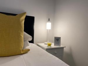 A bed or beds in a room at Tirah Guest House 