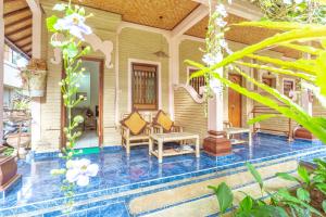 The swimming pool at or close to Teba House Ubud by ecommerceloka - CHSE Certified