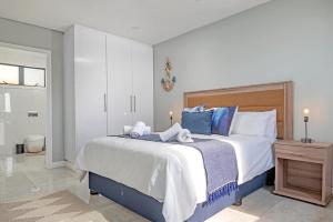 Postel nebo postele na pokoji v ubytování Sea De La Vie 25 + 7 fotografií