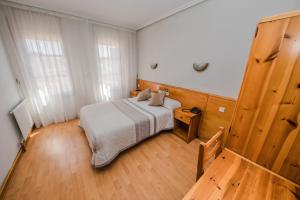 Postel nebo postele na pokoji v ubytování Alvi