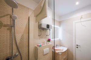 a bathroom with a shower and a sink at Amaris luxury apartments in Split