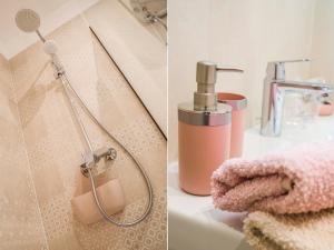 a bathroom with a shower head and a sink at Amaris luxury apartments in Split