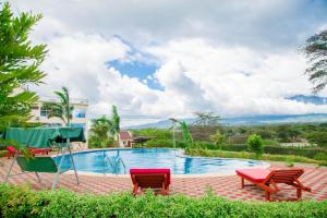 Bazén v ubytování A1 Hotel and Resort nebo v jeho okolí