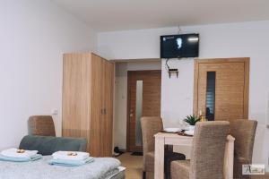 TV a/nebo společenská místnost v ubytování Relax Apartment - Ada