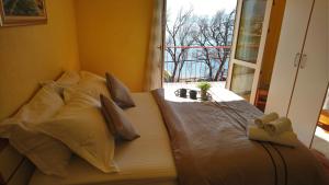 Postel nebo postele na pokoji v ubytování Beach Apartment Val