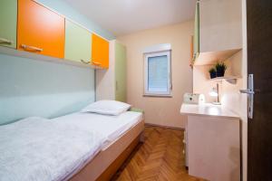 Postel nebo postele na pokoji v ubytování Beach Apartment Val
