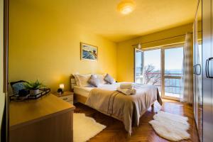 Postel nebo postele na pokoji v ubytování Beach Apartment Val