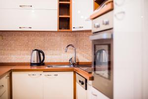 Kuchyň nebo kuchyňský kout v ubytování Beach Apartment Val