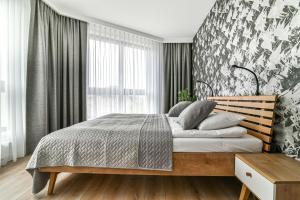 Postel nebo postele na pokoji v ubytování LTC-Apartments Portova