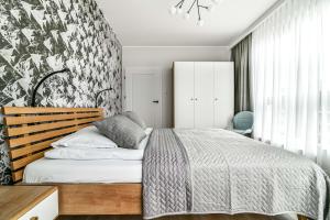 Posteľ alebo postele v izbe v ubytovaní LTC-Apartments Portova + 37 fotografií