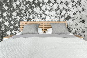 Postel nebo postele na pokoji v ubytování LTC-Apartments Portova