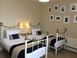 Posteľ alebo postele v izbe v ubytovaní Ashbury Bed & Breakfast
