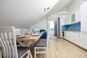 Η κουζίνα ή μικρή κουζίνα στο Apartments Nika