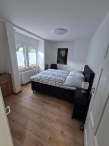 Ein Bett oder Betten in einem Zimmer der Unterkunft Ferienhaus Birute