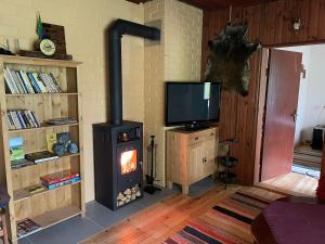 TV a/nebo společenská místnost v ubytování Vallaku Guesthouse