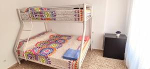 Katil atau katil-katil dalam bilik di Nice apartment near the port of Santa Pola