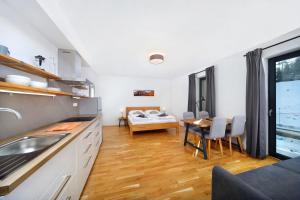 Łóżko lub łóżka w pokoju w obiekcie Podstata Apartments Vrchlabí - Rotterovka