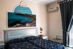 Posteľ alebo postele v izbe v ubytovaní Hotel Garibaldi