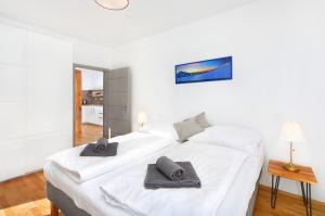 Łóżko lub łóżka w pokoju w obiekcie Podstata Apartments Vrchlabí - Rotterovka