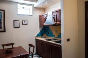 Kuchyňa alebo kuchynka v ubytovaní Hotel Garibaldi
