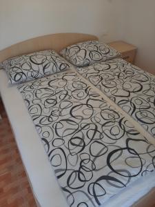 Ένα ή περισσότερα κρεβάτια σε δωμάτιο στο Apartments Martina