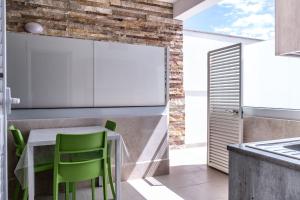 Кухня или мини-кухня в La Torre Apartments
