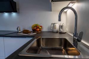 A kitchen or kitchenette at Numero 53 Tenna OSPITAR