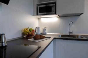 A kitchen or kitchenette at Numero 53 Tenna OSPITAR