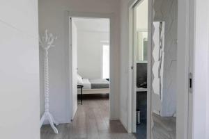 A bed or beds in a room at Numero 53 Tenna OSPITAR