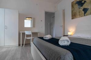 A bed or beds in a room at Numero 53 Tenna OSPITAR