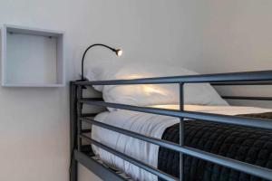 A bed or beds in a room at Numero 53 Tenna OSPITAR