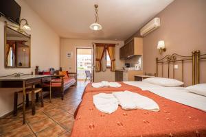 Posteľ alebo postele v izbe v ubytovaní Kokalas Resort